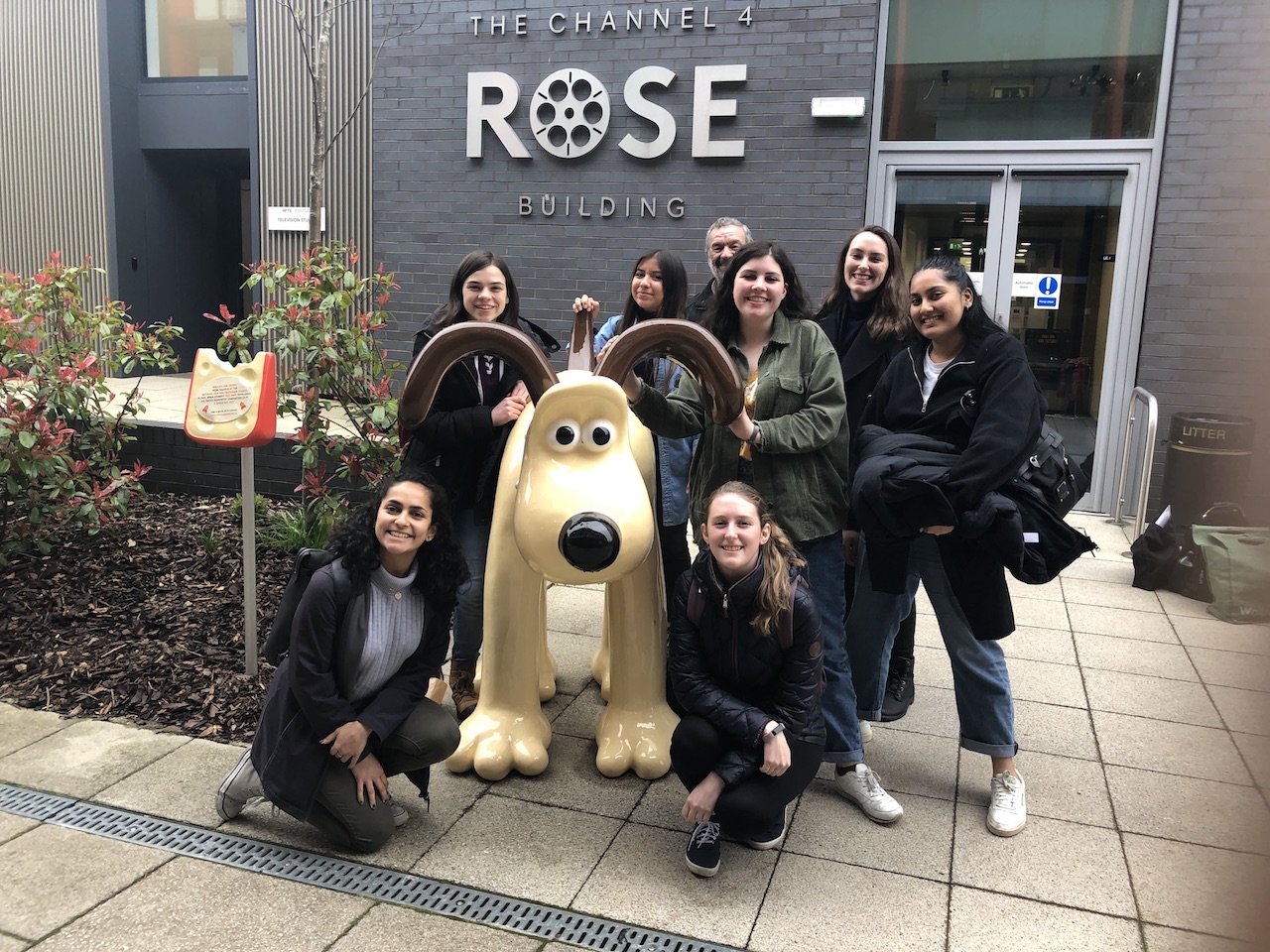 Group photo of the spring 2019 class with a statue of Gromit in front of the Channel 4 Rose Building